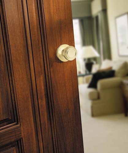 Kwikset 720CN-3BB polished brass passage door knob
