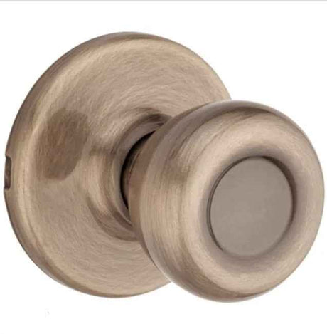 Kwikset CP200T Clear Pack Tylo Knob Passage Door Lock in Antique Brass