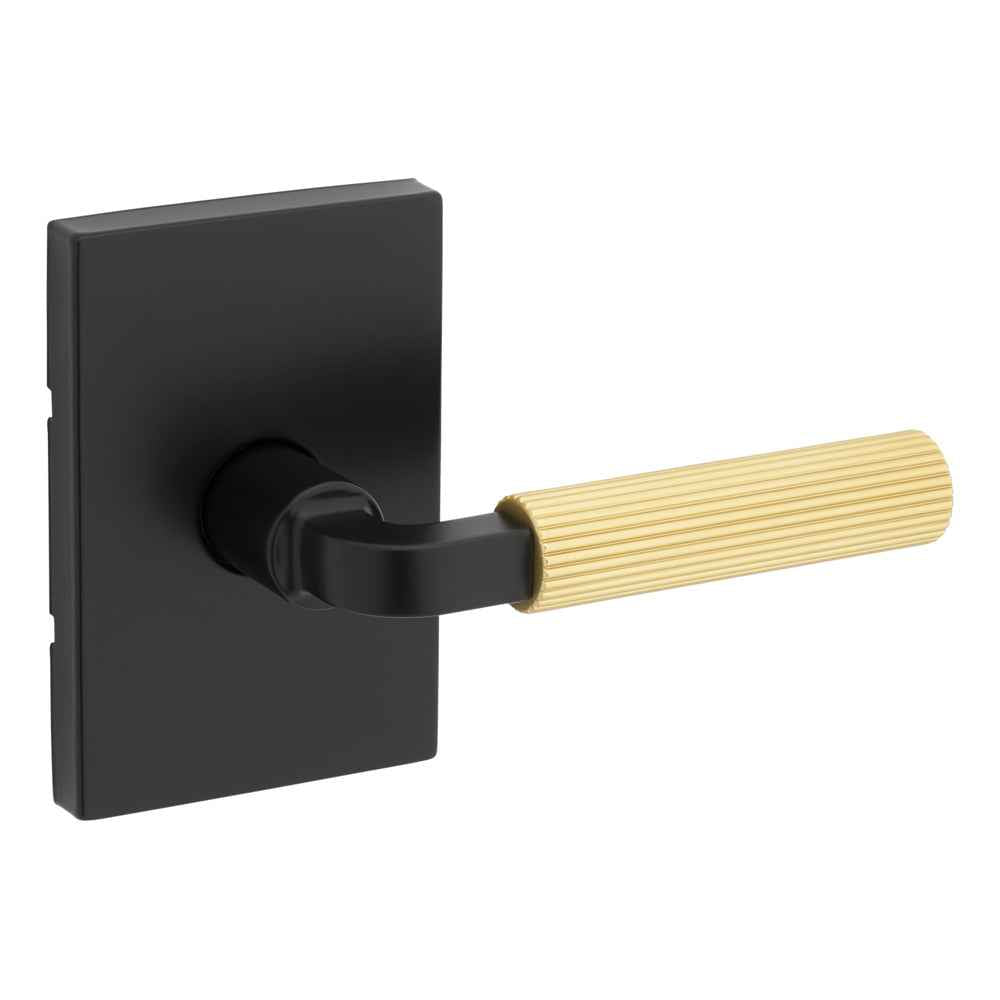 Kwikset 720MALRCT-514X4 Mirada Reeded Pattern Lever in Matte Black by Satin Brass