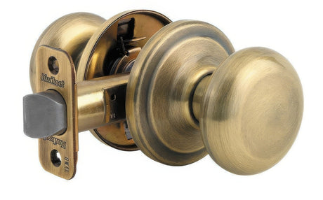 Kwikset CP720J-5 antique brass passage door knob