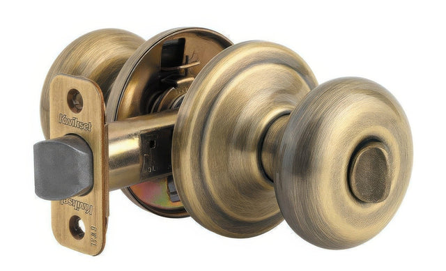 Kwikset CP730J-5 antique brass privacy door knob
