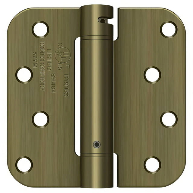 Deltana DSH4R55 antique brass spring hinge