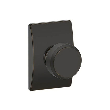Schlage F10BWE716CEN aged bronze passage door knob
