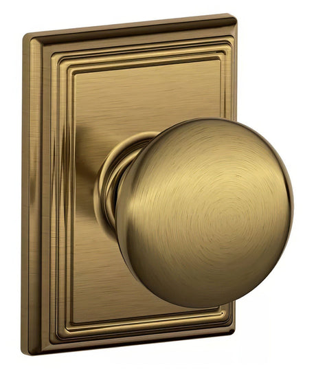 Schlage F10PLY609ADD antique brass passage door knob