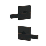 Schlage FC172NBK716COL aged bronze pair of dummy door lever