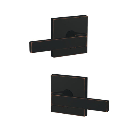 Schlage FC172NBK716COL aged bronze pair of dummy door lever