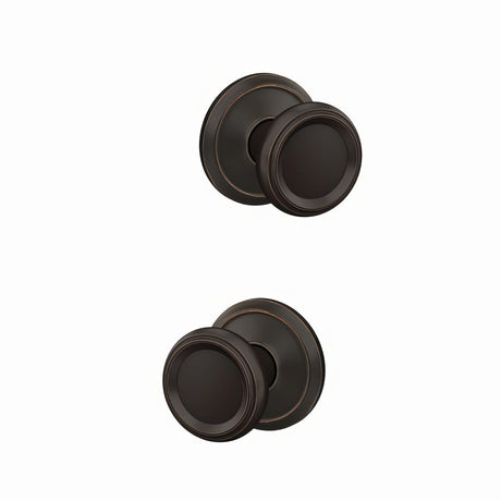 Schlage FC172OFM716ALD aged bronze pair of dummy door knob