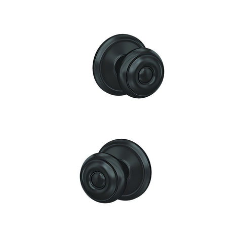 Schlage FC21GEO622ALD matte black passage & privacy door knob