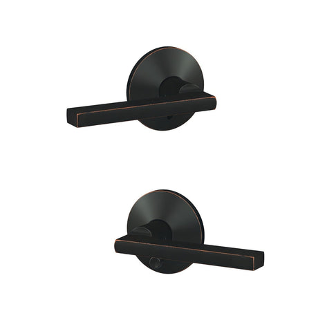 Schlage FC21LAT716KIN aged bronze passage & privacy door lever