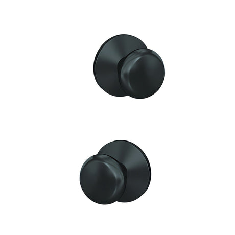 Schlage FC21PLY622KIN matte black passage & privacy door knob