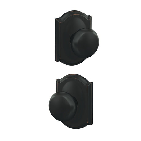 Schlage FC21PLY716CAM aged bronze passage & privacy door knob