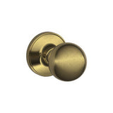 Dexter by Schlage J10CNA609 antique brass passage door knob