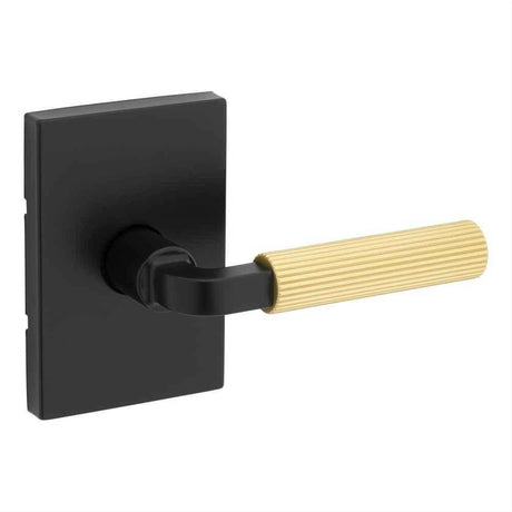 Kwikset 720MALRCT-514X4 Mirada Reeded Passage Lever with Satin Brass Grip and Rectangular Rose Matte Black / Satin Brass